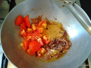 when the onions, ginger garlic is browned,add the tomatoes