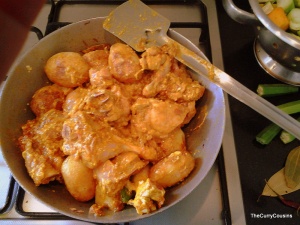 mix the chicken and the potatoes to the masala